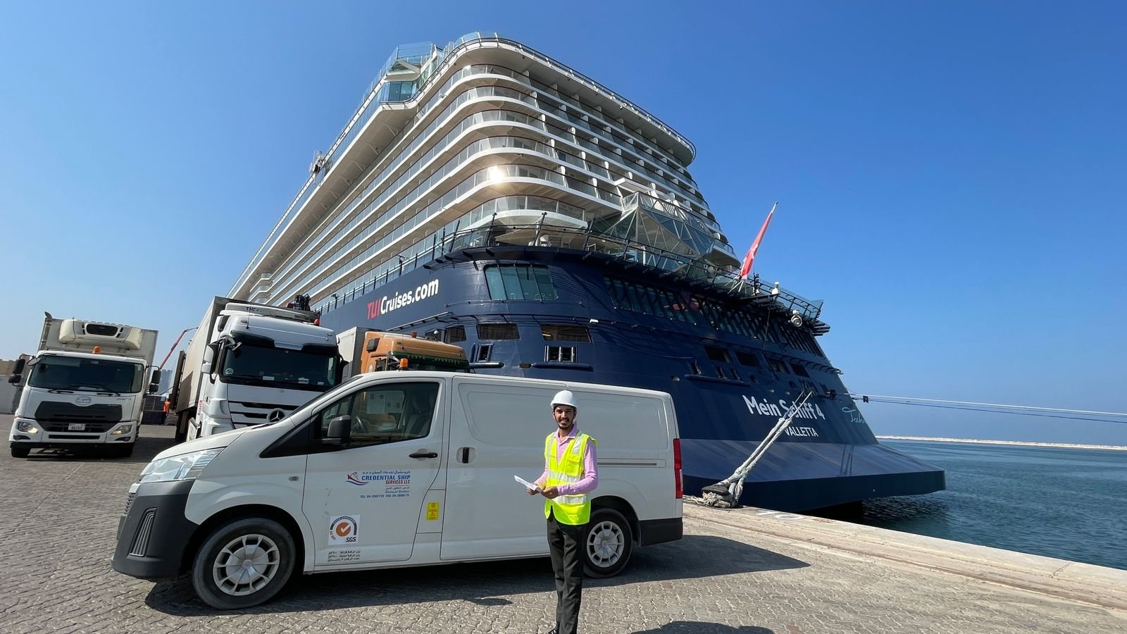 Credential Ship Services branded van and crew alongside a cruise vessel at a UAE cruise terminal